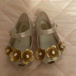 Gold mini Melissa size 5